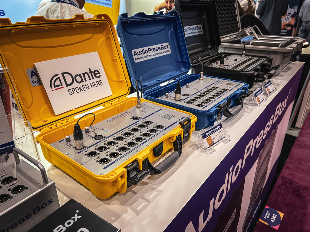 InfoComm 2023 - AudioPressBox trade show booth demonstration — APB 216 C-D, APB-320 C-USB, APB-224 C
