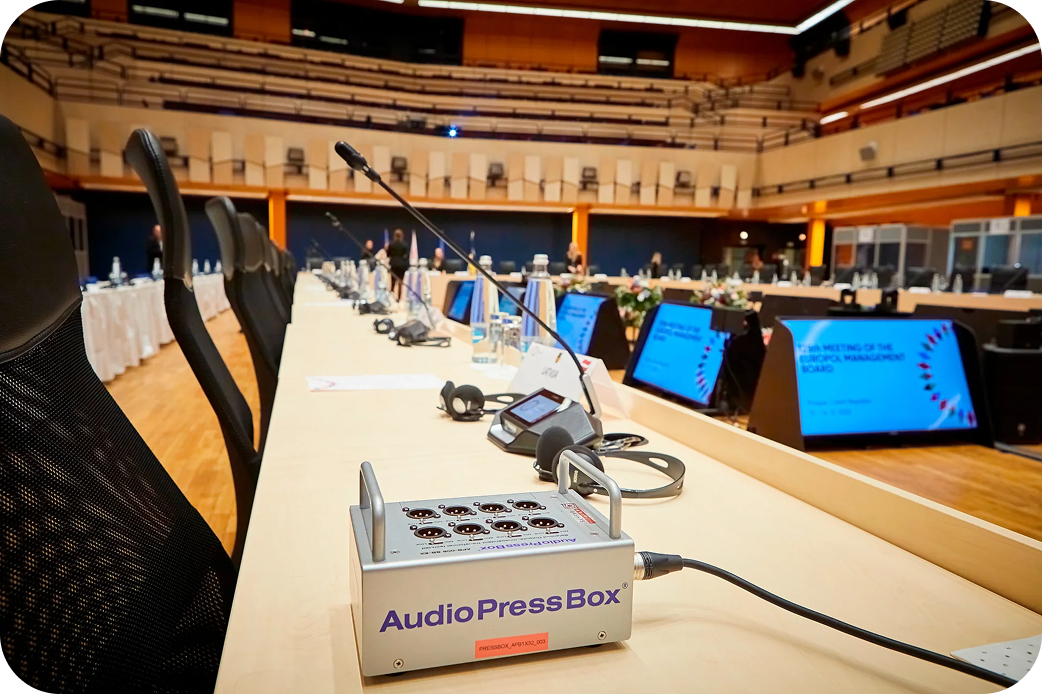 Press conference room setup — AudioPressBox press box prepared for media audio outputs