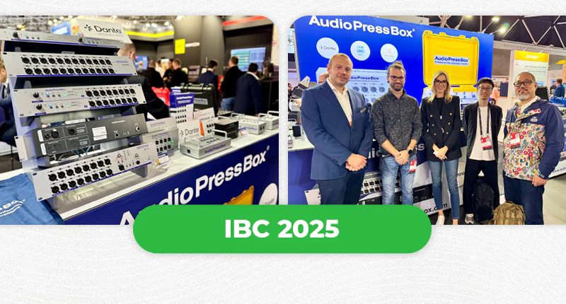 IBC 2025 - AudioPressBox trade show booth demonstration — visitors discussing press box audio distribution