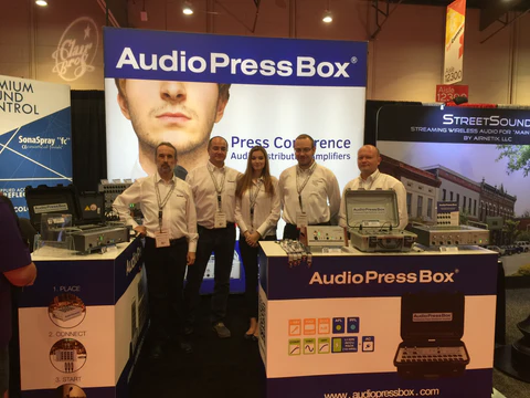 Infocomm 2016, Las Vegas- AudioPressBox team at trade show booth — press boxes on display for media audio distribution