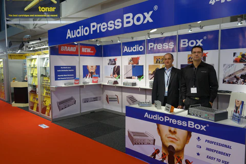 ISE 2014 - AudioPressBox team at trade show booth — press boxes on display for media audio distribution
