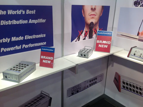 ISE 2014 - AudioPressBox trade show booth demonstration — visitors discussing press box audio distribution