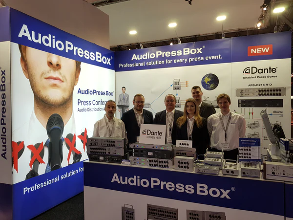 ISE 2018 Amsterdam - AudioPressBox team at trade show booth — press boxes on display for media audio distribution