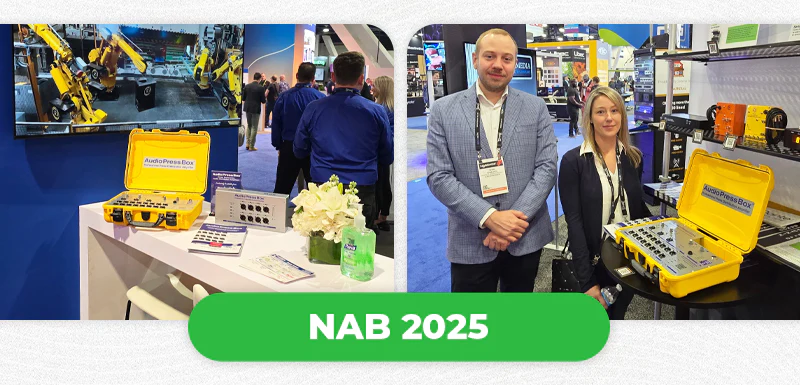NAB 2025 - AudioPressBox trade show booth demonstration — visitors discussing press box audio distribution
