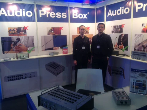 Prolight+Sound 2014, Frankfurt - AudioPressBox trade show booth demonstration — visitors discussing press box audio distribution